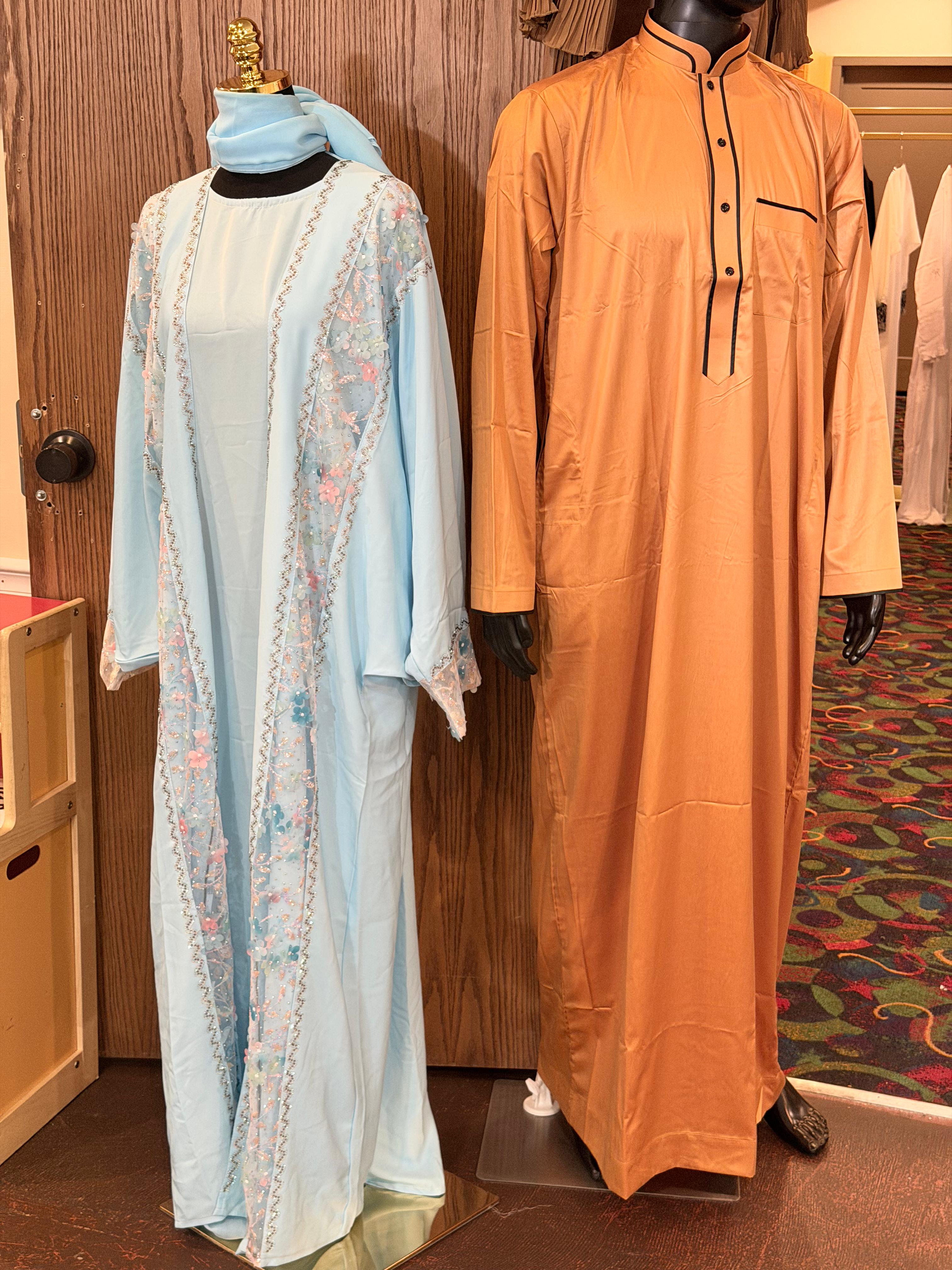 Man and woman muslim dress